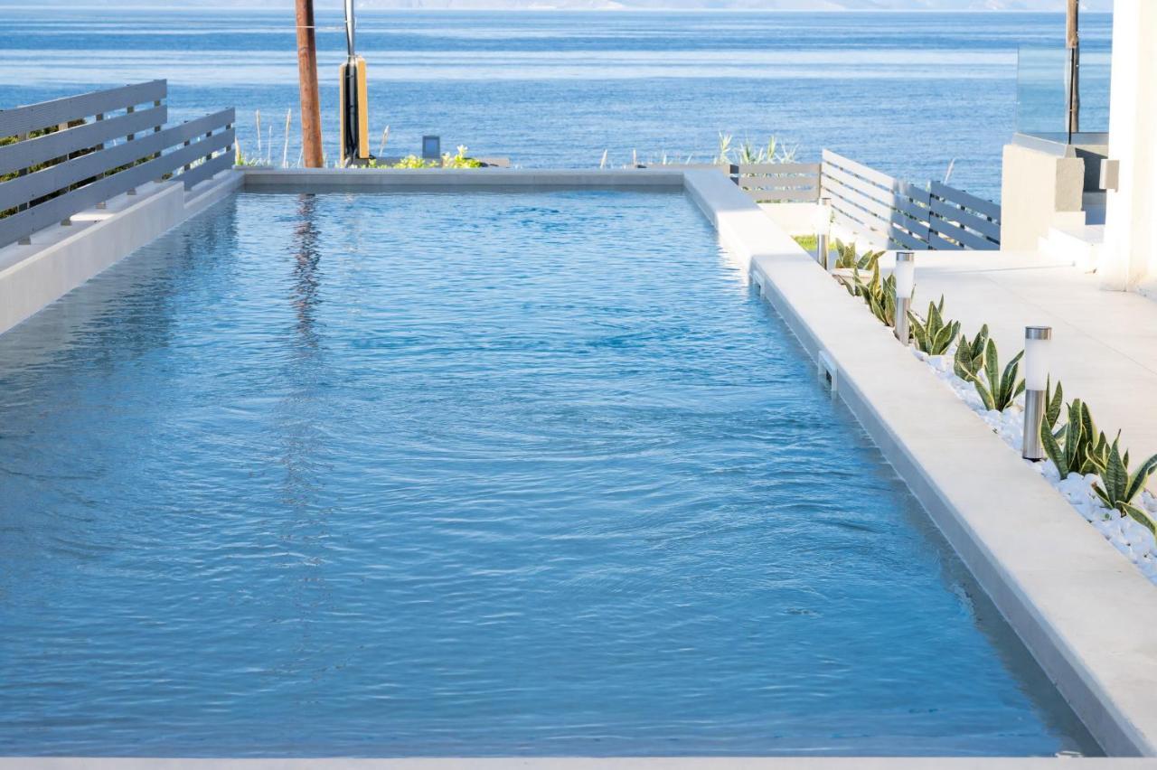 Theros Suites Dhiminio ภายนอก รูปภาพ