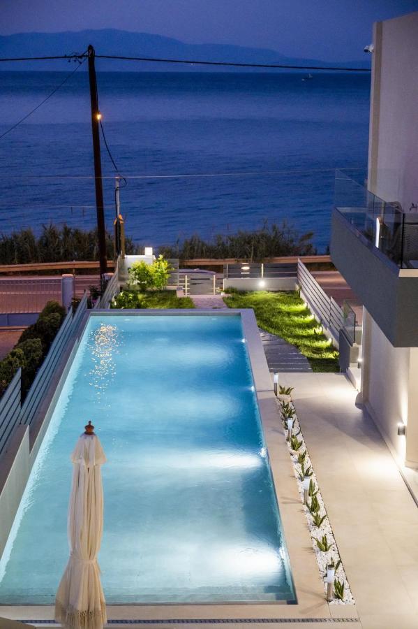 Theros Suites Dhiminio ภายนอก รูปภาพ