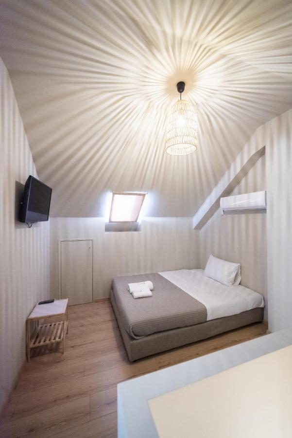 Theros Suites Dhiminio ภายนอก รูปภาพ
