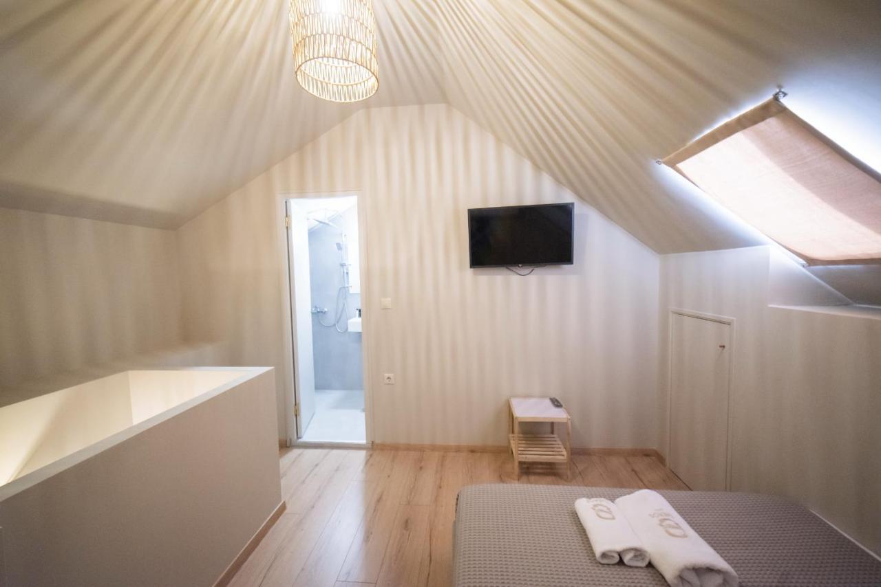 Theros Suites Dhiminio ภายนอก รูปภาพ